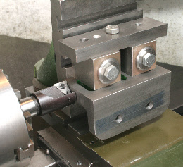 Milling on the lathe using a vertical slide.
